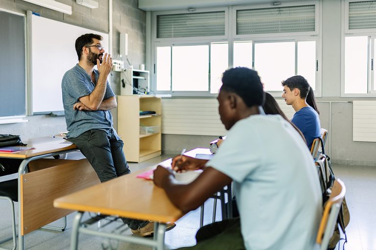 bigstock-Students-Listening-To-Male-Tea-476037059-4-768x512 image